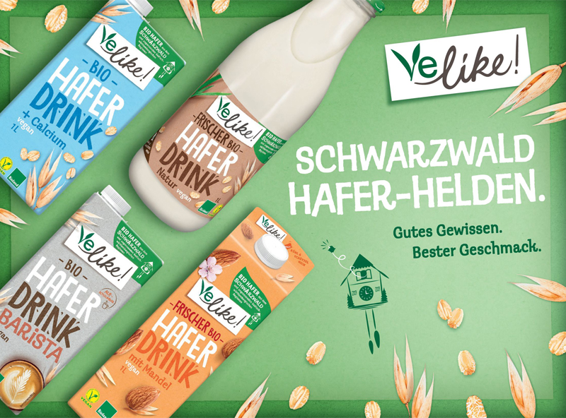 Plakatmotiv der Marke Velike! mit mehreren Bio-Haferdrinks und dem Schriftzug „Schwarzwald Hafer-Helden – Gutes Gewissen. Bester Geschmack.“